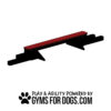 A red and black Jump Balance Beam with support legs, designed for Dog Park fun, is shown on a white background. Below, text reads: "Play & agility powered by GymsForDogs.com" with a paw print graphic.