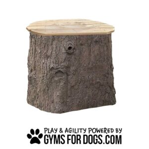 Natural Jumping Stump - XLarge: A wooden dog agility platform shaped like a flat-topped tree stump. The text below says "PLAY & AGILITY POWERED BY GYMSFORDOGS.COM" and features a paw print icon.
