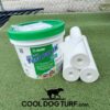 A tub of Mapei Ultrabond Turf PU 1K adhesive and three rolled-up white sheets rest on artificial turf. The Cool Dog Turf logo with a dog silhouette and text is visible at the bottom.